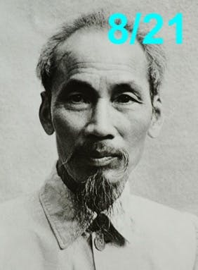 A black-and-white photo of a balding East Asian man with some silver hair, a mustache, and a goatee. He is wearing a light-colored collared shirt. 8/21 is written at the top right of the image.