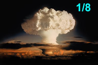 A photo of a large white mushroom cloud against a black-and-orange sky. 1/8 is written at the top right of the image.