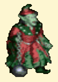 A humanoid creature with green skin, wearing a pointed red-and-green hat, red-and-green robes, and pointed green shoes, holding a metal chain attached to a large metal ball
